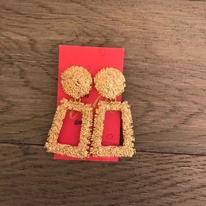 Gold statement earrings